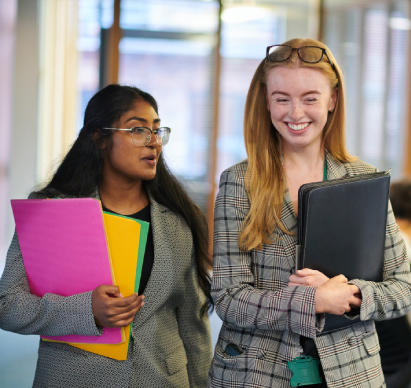 Two apprentices walking together. 